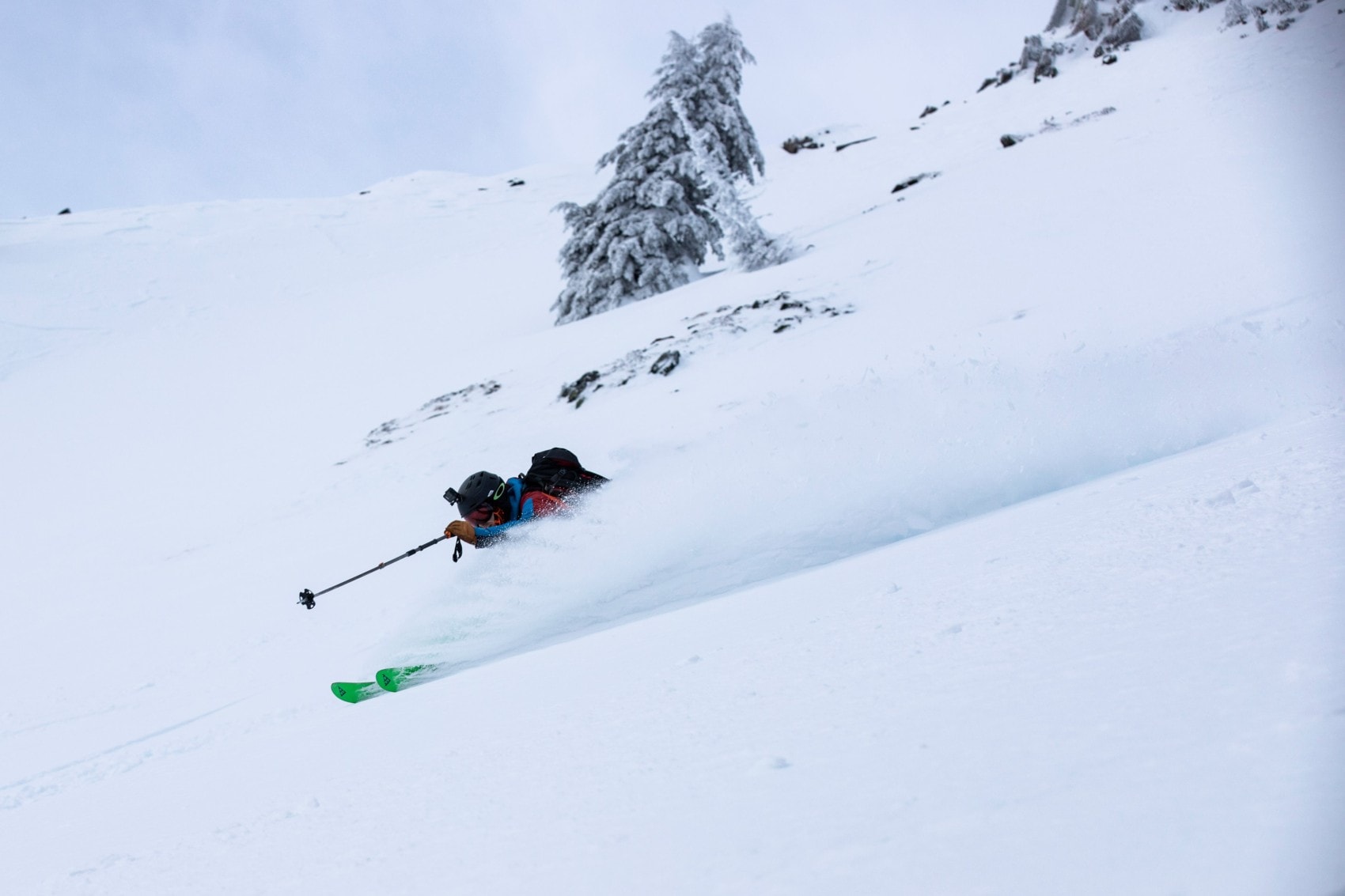 skier racing down slope banner
