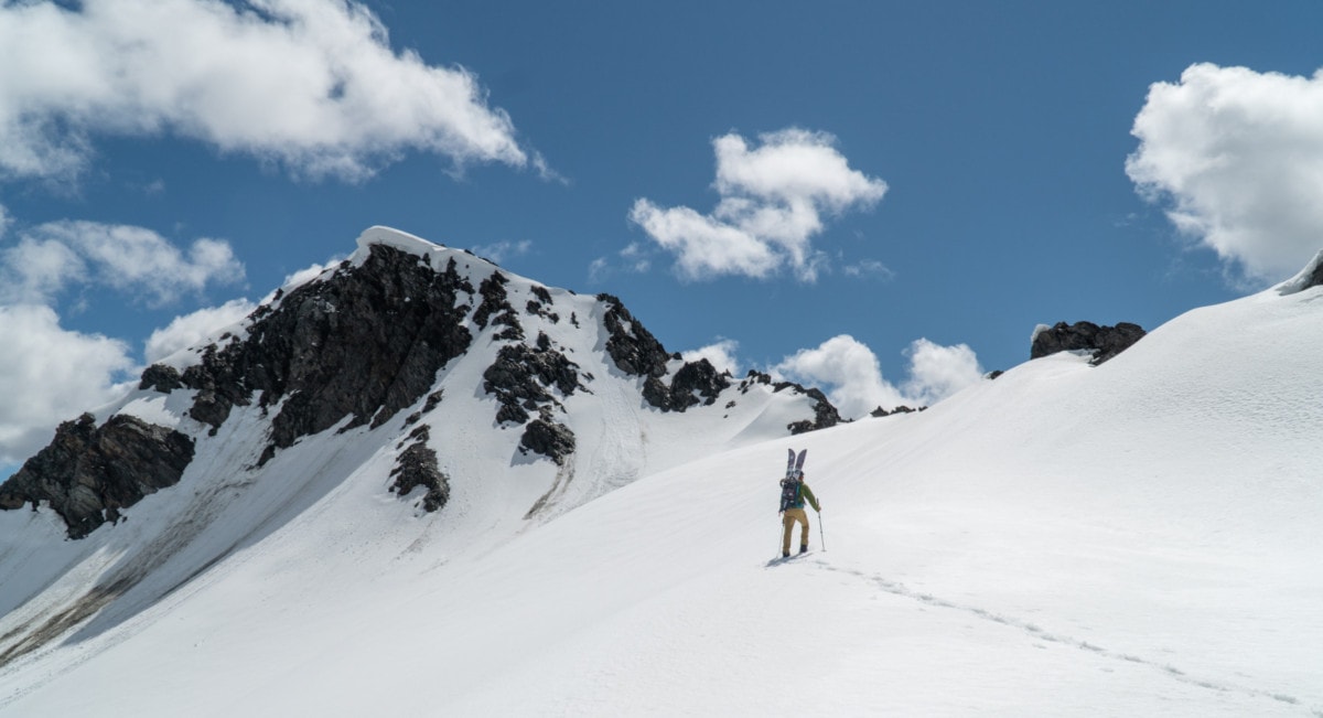 hiker walking along the mccrae glacier
