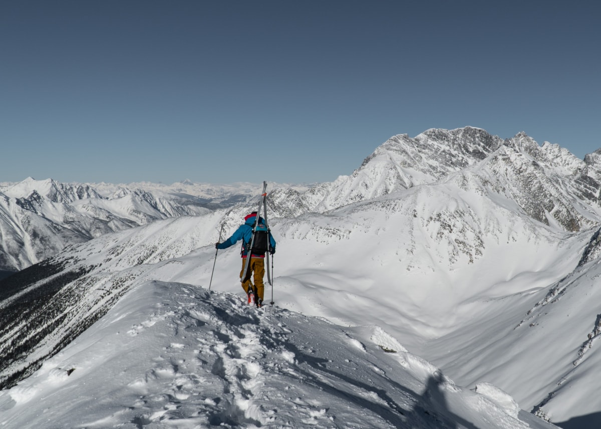 skier on the summit of ursus minor mt