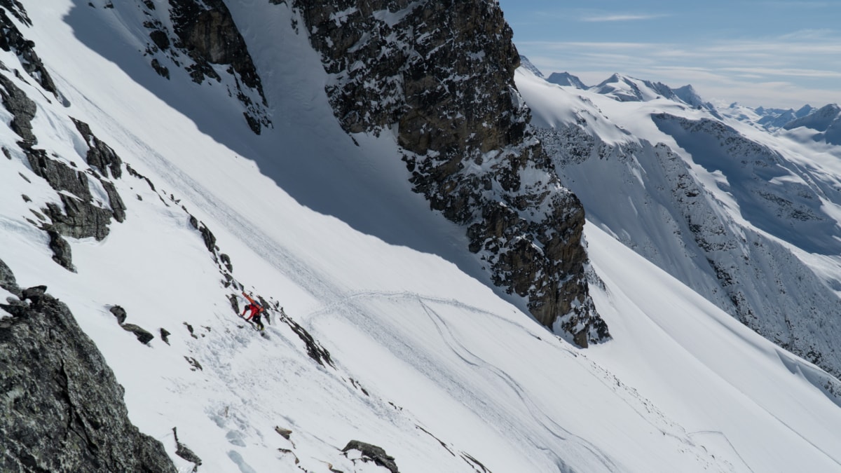 skier mountaineer climbing towards the sir donald uto col