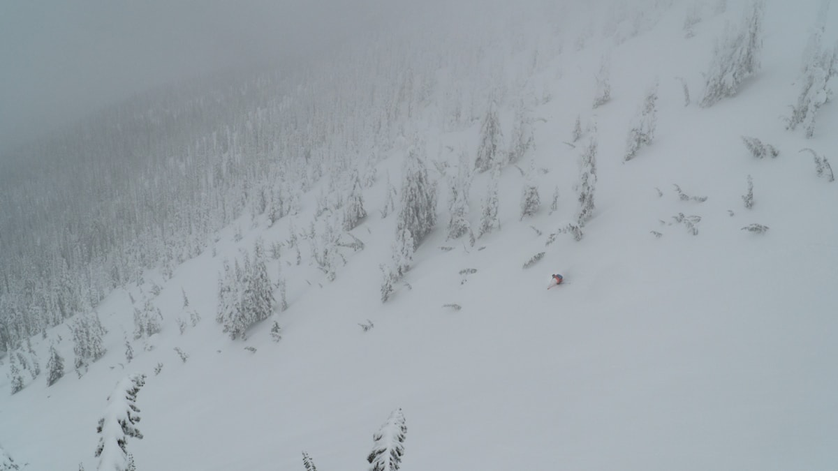 skier descending the mcgill main chute in poor visibility